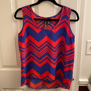 Red and blue patterned blouse